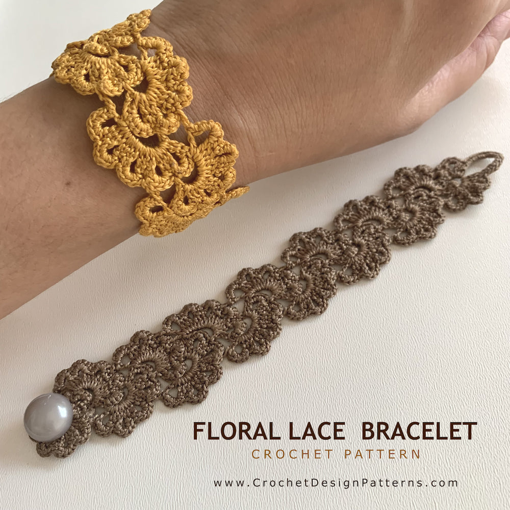 A hand wearing a wide floral lace crochet bracelet in mustard yellow, with a second matching bracelet shown flat in taupe brown on a light beige surface. Text at the bottom reads 'FLORAL LACE BRACELET CROCHET PATTERN' with a website URL.